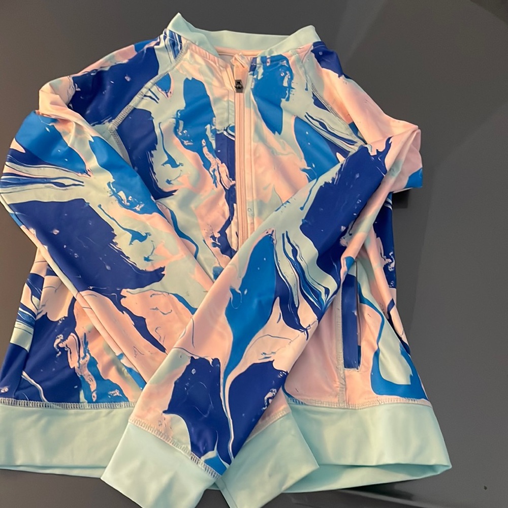 Multi colored lightweight jacket with zipper.